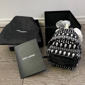 YSL skeleton mini backpack keychain purse